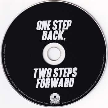 CD Flawes: < >> - One Step Back, Two Steps Forward