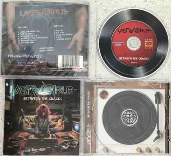 CD Lastworld: Between The Cracks