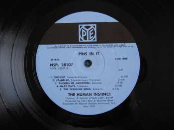 LP The Human Instinct: Pins In It